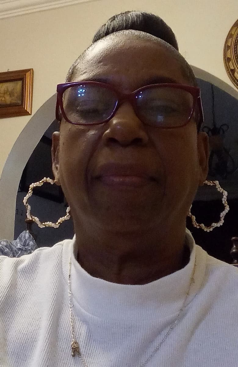 A selfie photograph of the website's owner, Christiline.